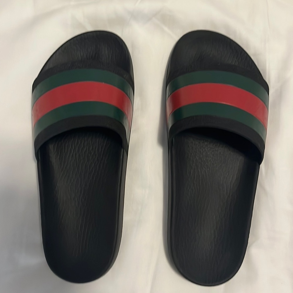 Black Gucci Slides for sale at 160$ USD